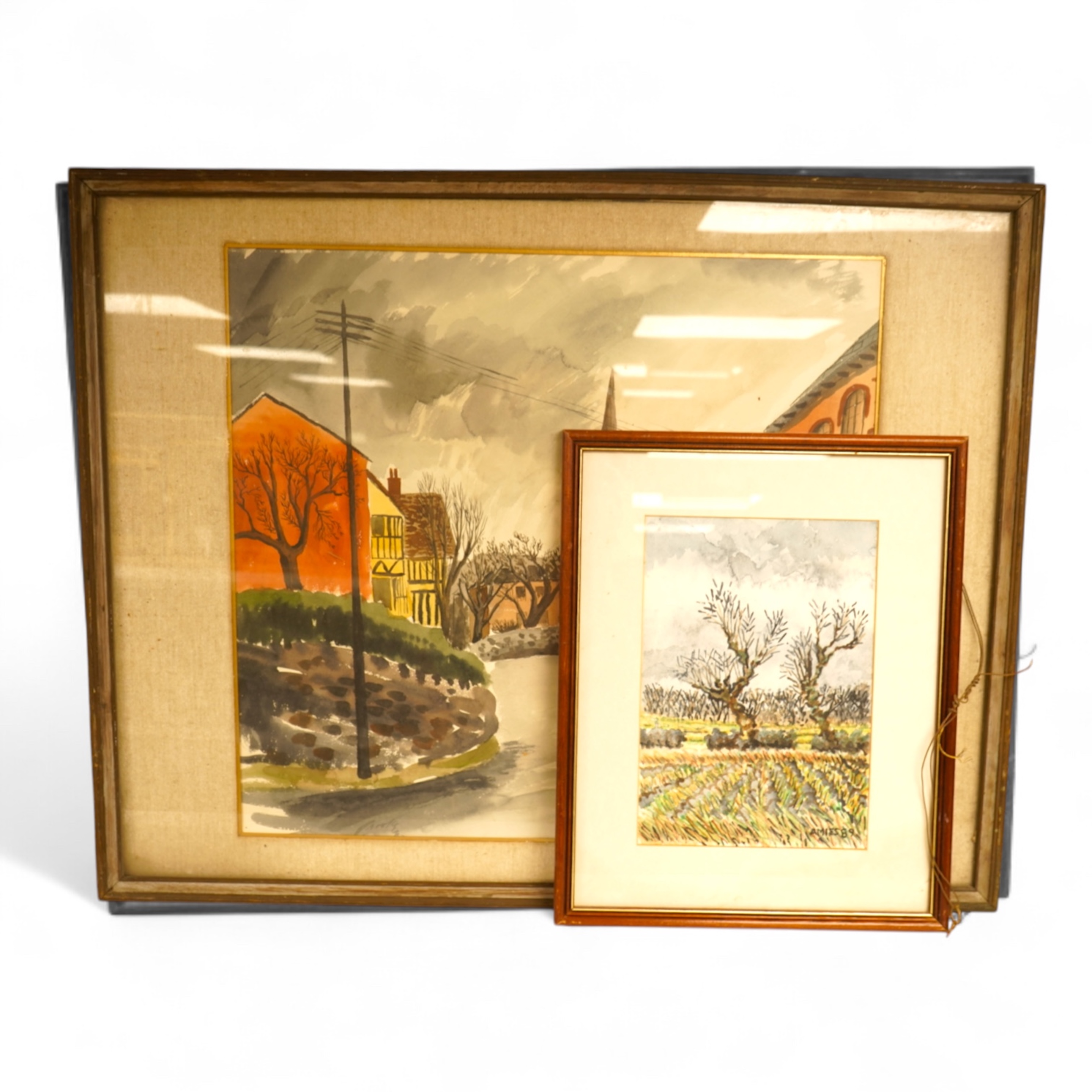 Anthony Amies (1945-200), Rural landscape, signed and dated '89, together with another larger work by a different hand, Street scene, both watercolours, largest 45 x 46cm